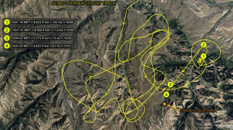 Satellite map showing the flight path of aircraft N23BD in yellow, with altitude and speed data points leading to the crash site in mountainous terrain.